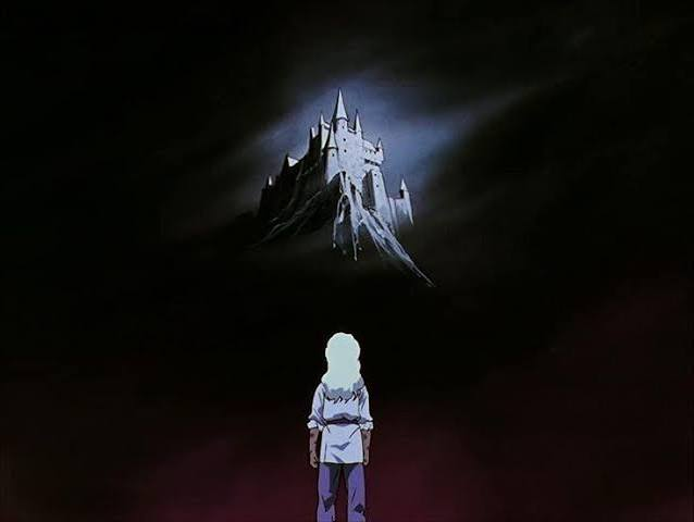 A distant illuminated castle above a lone figure